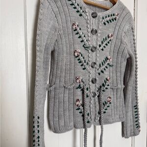 Embroidered vintage peplum sweater